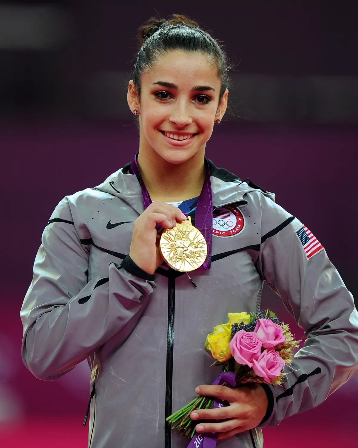 Gold medalist Alexandra Raisman of the United States poses on the podium during the medal ceremony for the Artistic Gymnastics Women&rsquo;s Floor Exercise final on Day 11 of the London 2012 Olympic Games at North Greenwich Arena on August 7, 2012