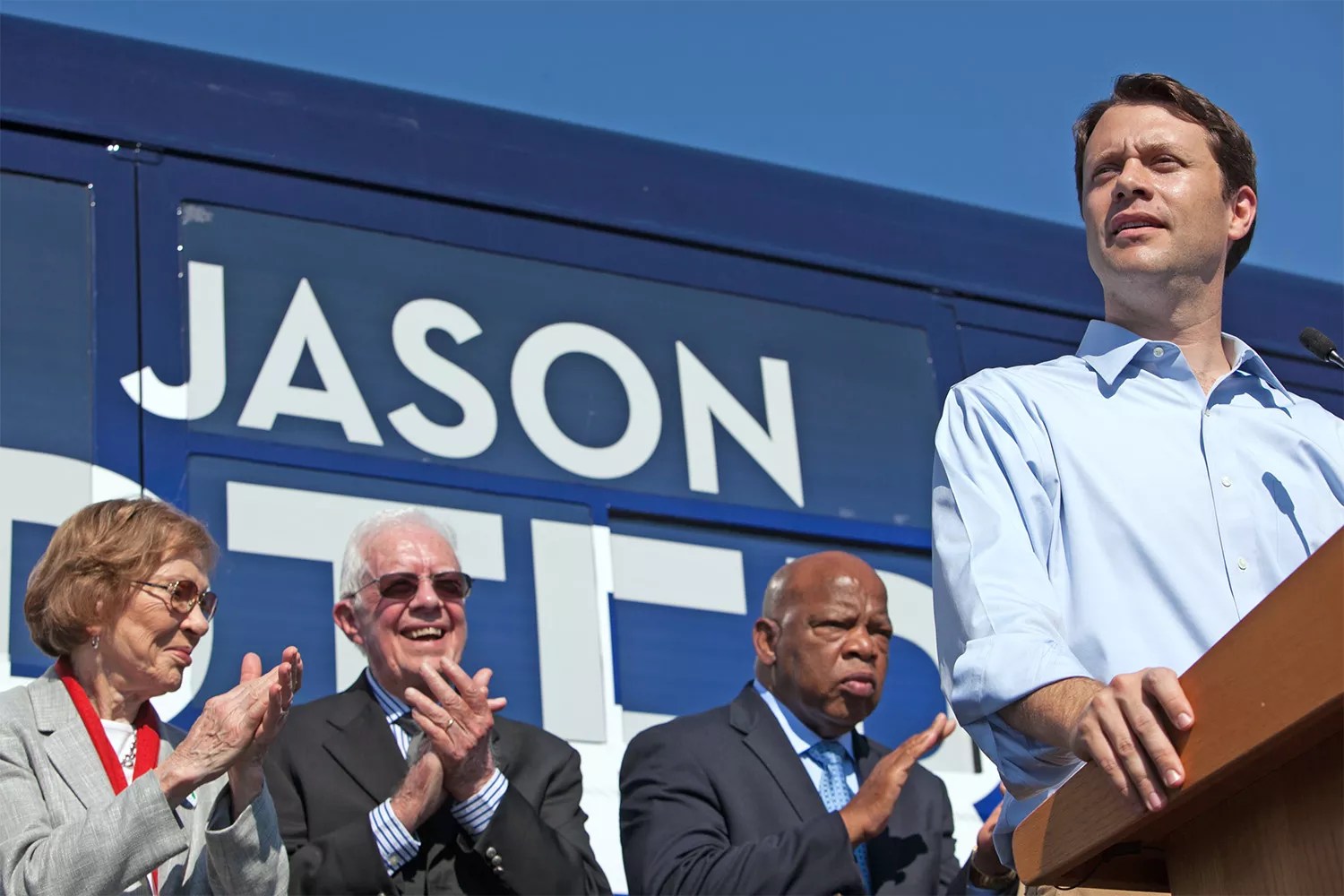 COLUMBUS, GA - OCTOBER 27: Georgia Democratic gubernatorial candidate and State Sen. Jason Carter (R) speaks during a campaign event with his grandparents, former first lady Rosalynn Carter (L), former U.S. President Jimmy Carter (2nd L) and U.S. Rep. John Lewis (D-GA) (2nd R) at Emmanuel Christian Community Church on October 27, 2014 in Columbus, Georgia. Jason Carter is running against the Republican incumbent Georgia Republican Gov. Nathan Deal. (Photo by Jessica McGowan/Getty Images)
