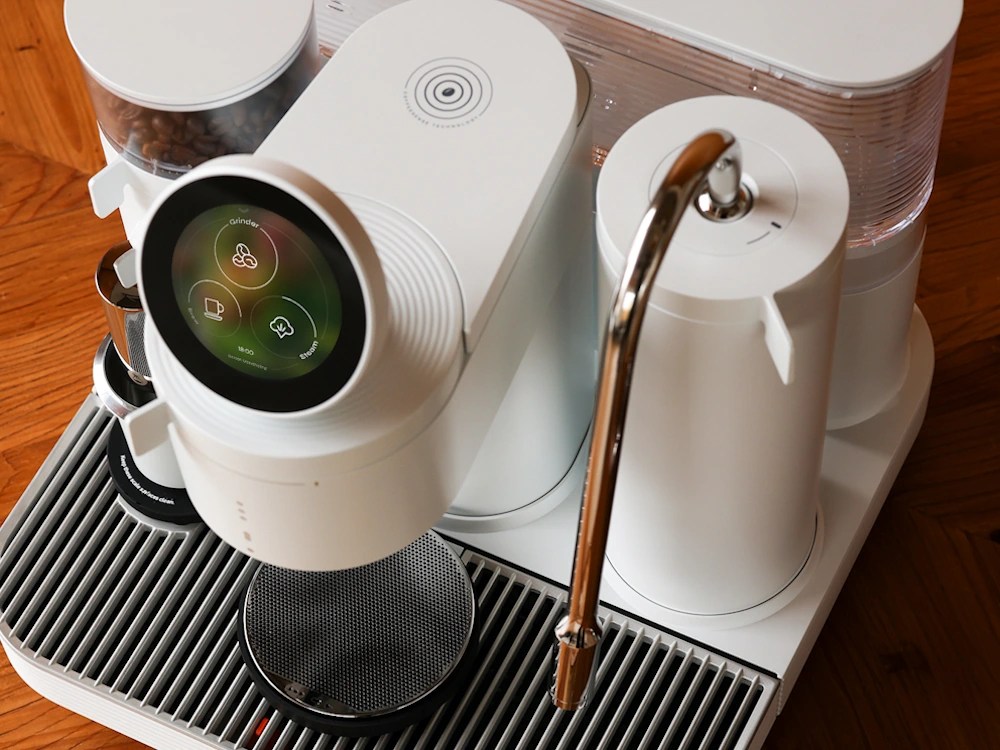 - Healthy Brew Hub A white Meraki home espresso machine.