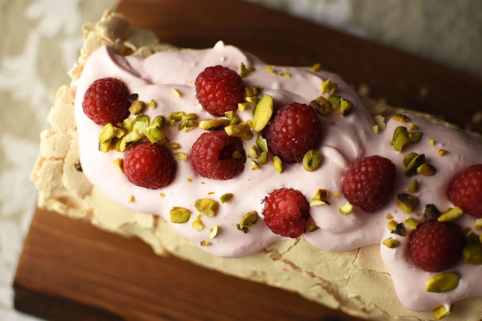 Dessert Meringue Roulade with Rose Cream and Raspberries Perfectly