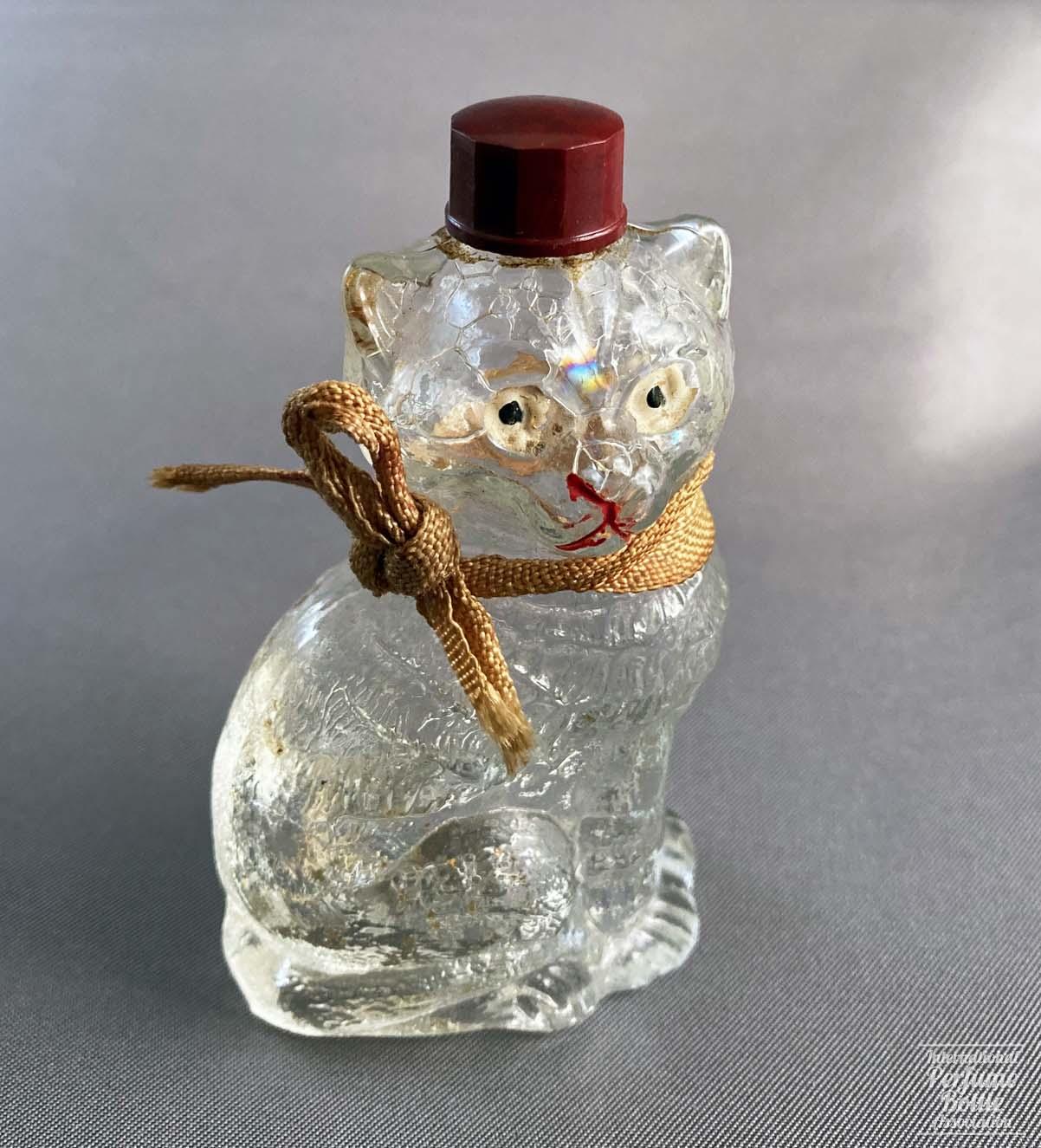 A Cat Parade International Perfume Bottle Association
