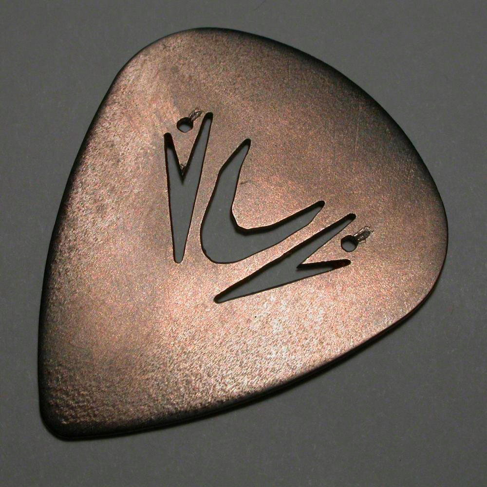 Titanium guitar pick, a sample of the element Titanium in the Periodic