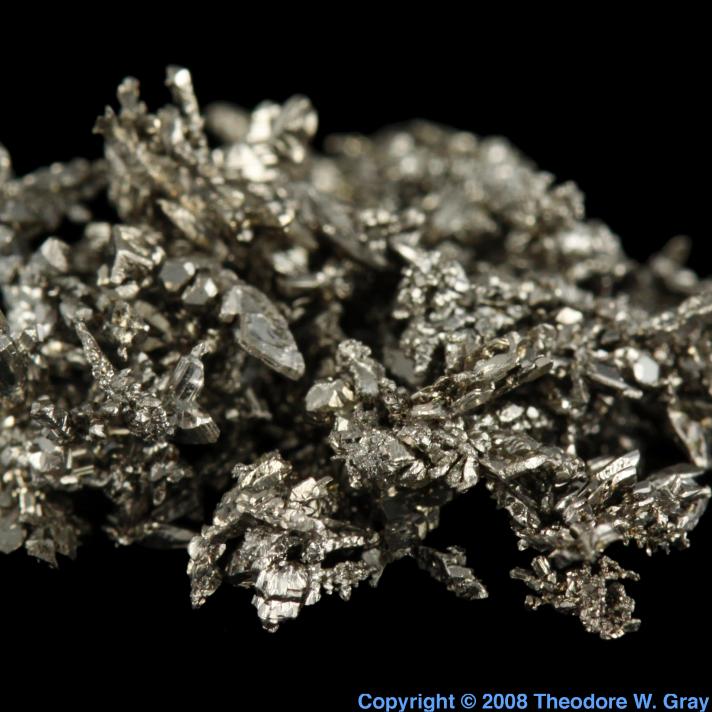 Gas phase titanium crystals, a sample of the element Titanium in the