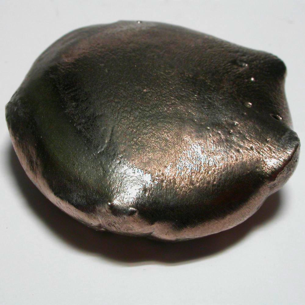 Arc melted button, a sample of the element Nickel in the Periodic Table