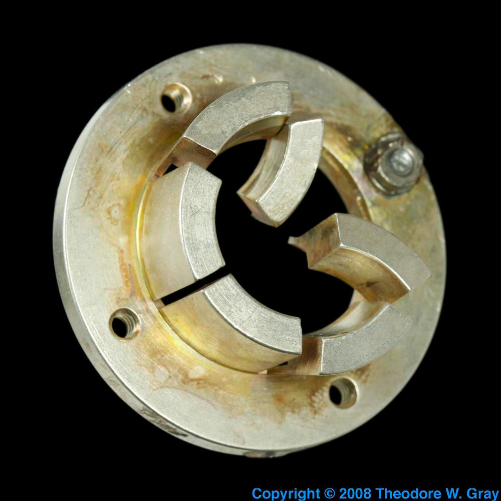 Broken lab equipment part, a sample of the element Silver in the