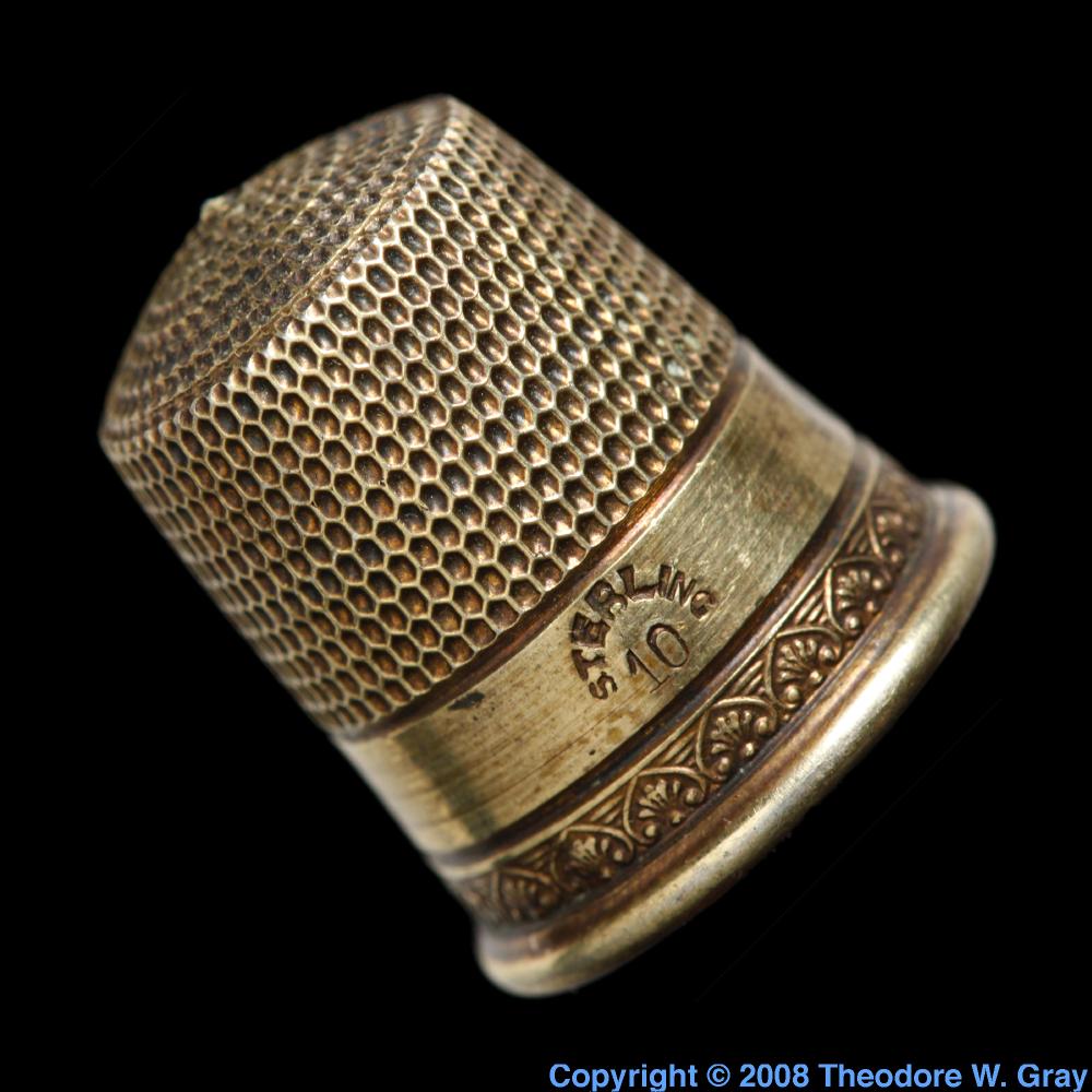 Antique sterling thimble, a sample of the element Silver in the