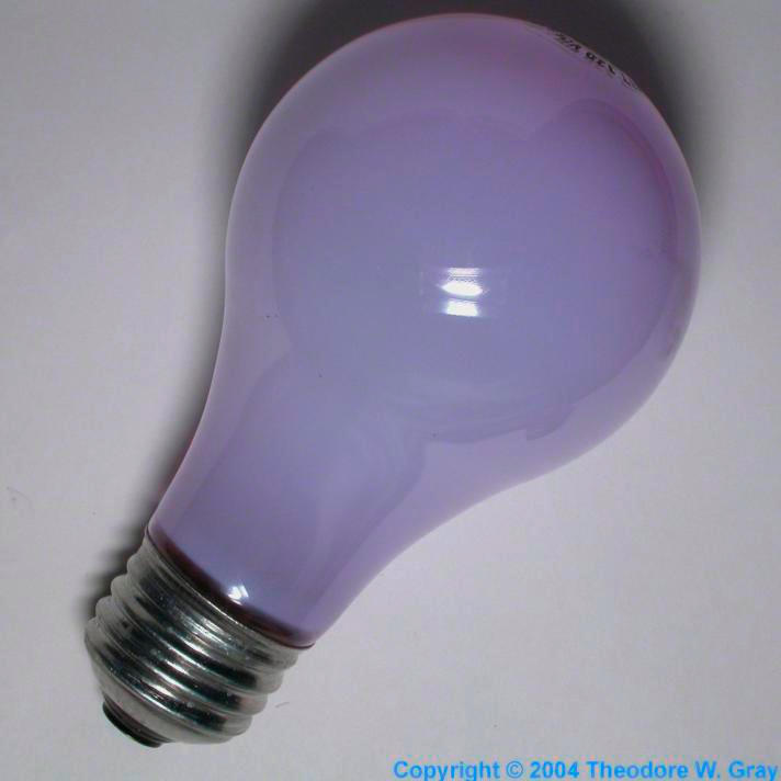 Daylight incandescent bulb, a sample of the element Neodymium in the
