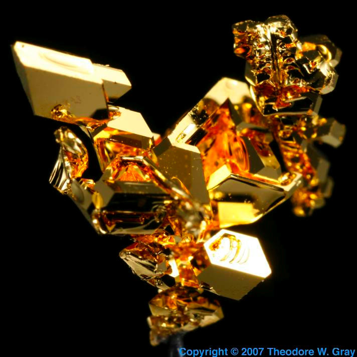 Vapor deposited crystal, a sample of the element Gold in the Periodic Table