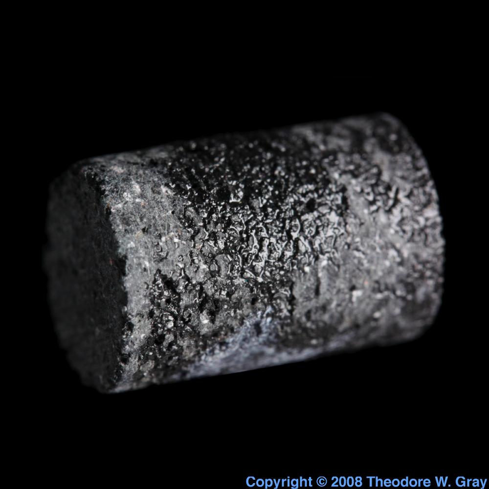 Fuel pellet, a sample of the element Uranium in the Periodic Table
