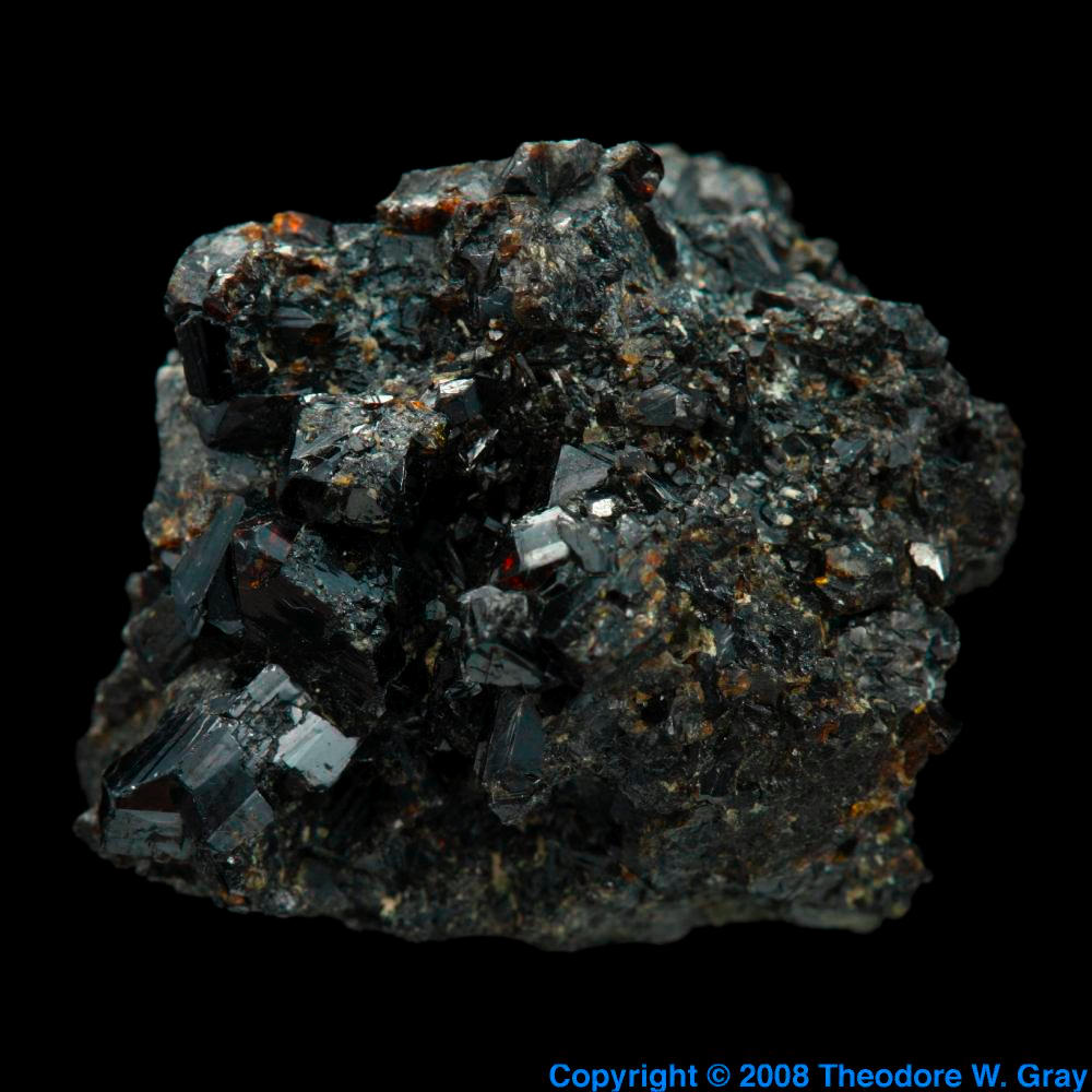 Cassiterite, a sample of the element Tin in the Periodic Table