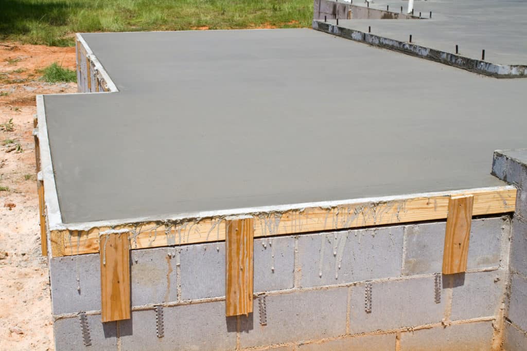 Concrete Slab Cure Time How Long Until You Can Build On It?