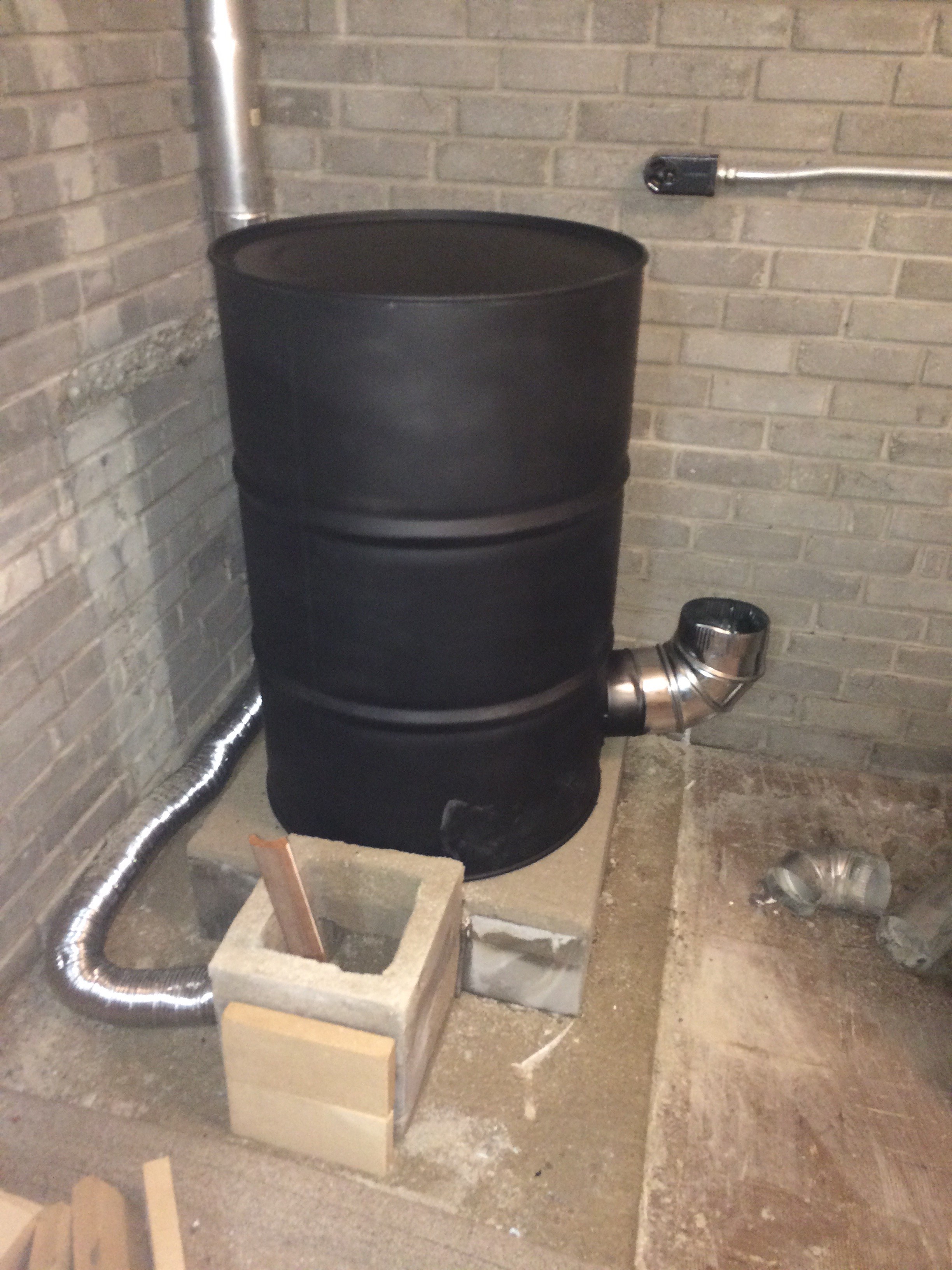 Rocket stove backdraft (rocket mass heater forum at permies)