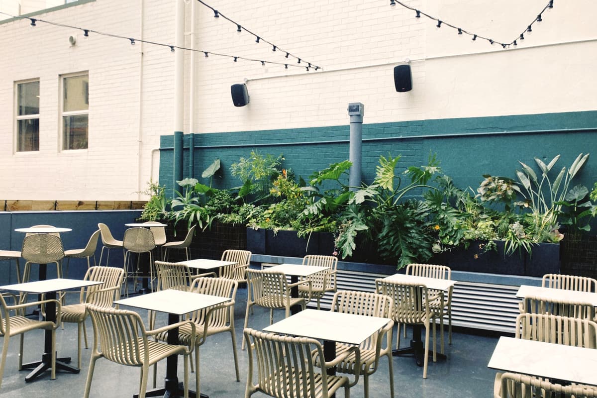 Step Into The CBD’s Newest (And Lushest) Rooftop Cocktail Bar