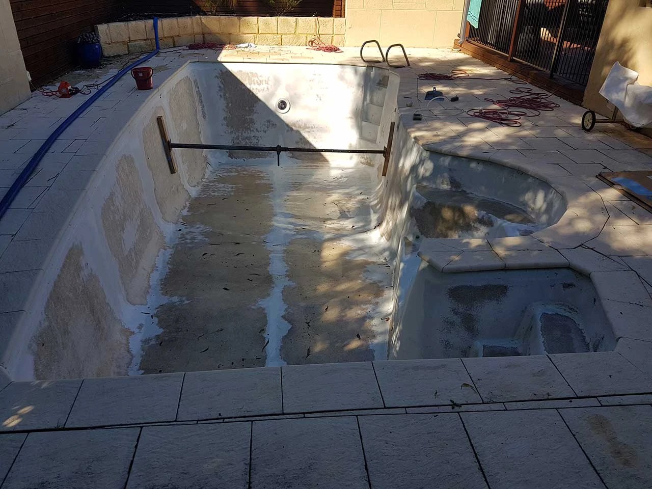 I have Black spots, Bubbles & Osmosis in my Fibreglass swimming pool!