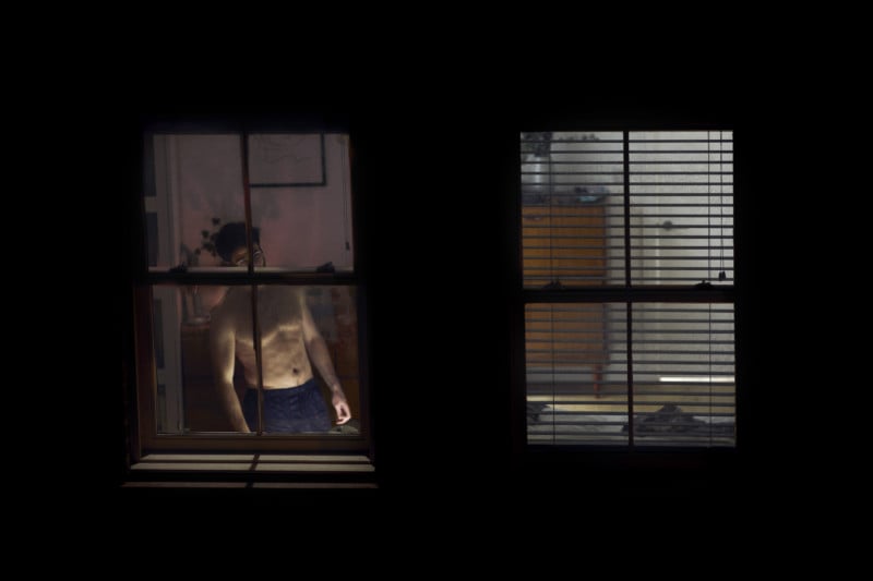 Photographer Documents Neighbors' Isolation from His Bedroom Window