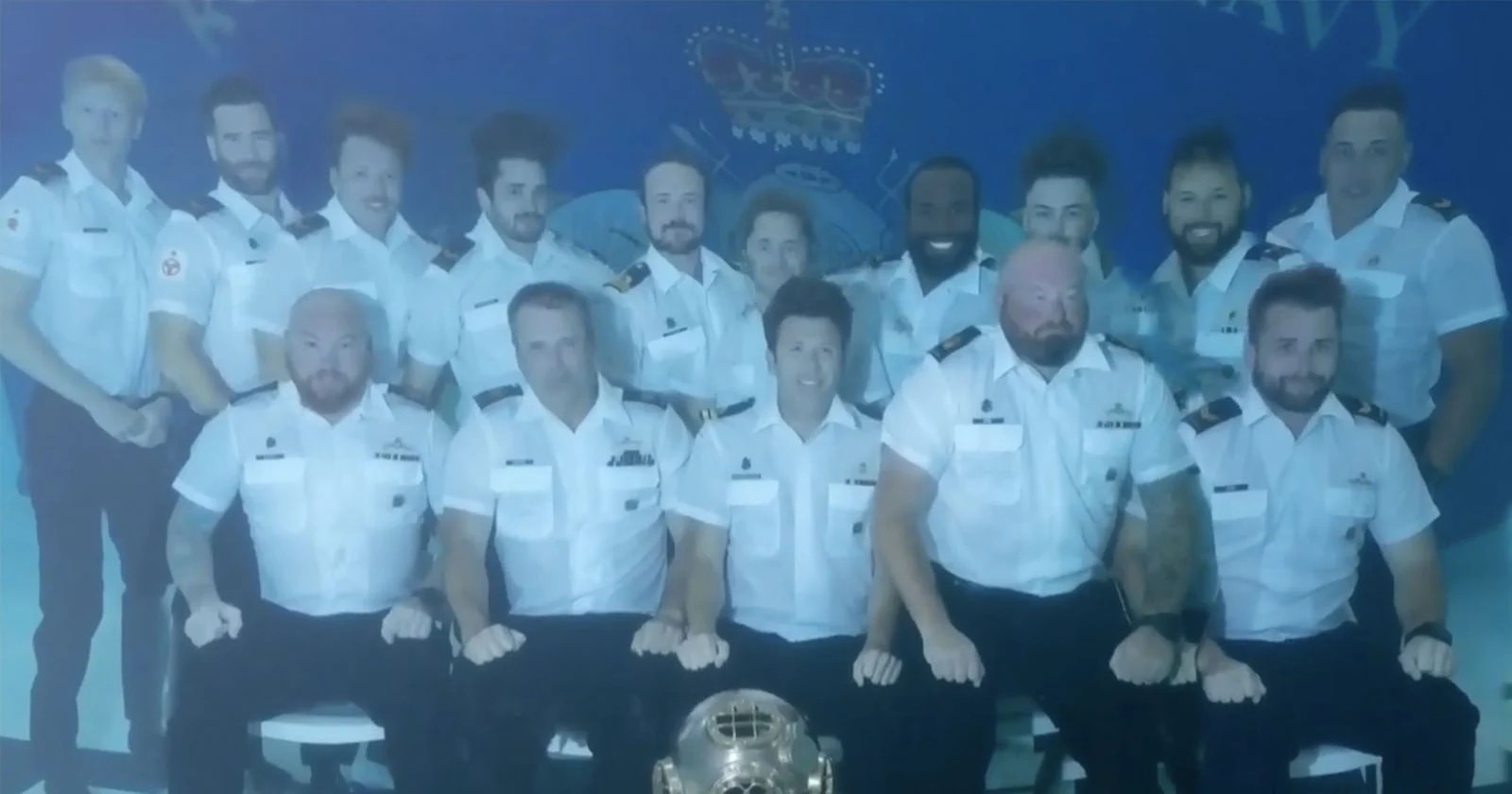 Photographer Tasked with Capturing Underwater Graduation Class Photo