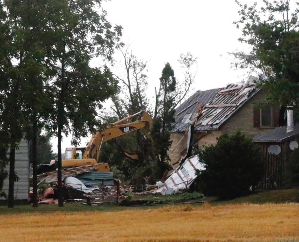 Wild weather destroys barn near Thedford, rips out hydro poles near