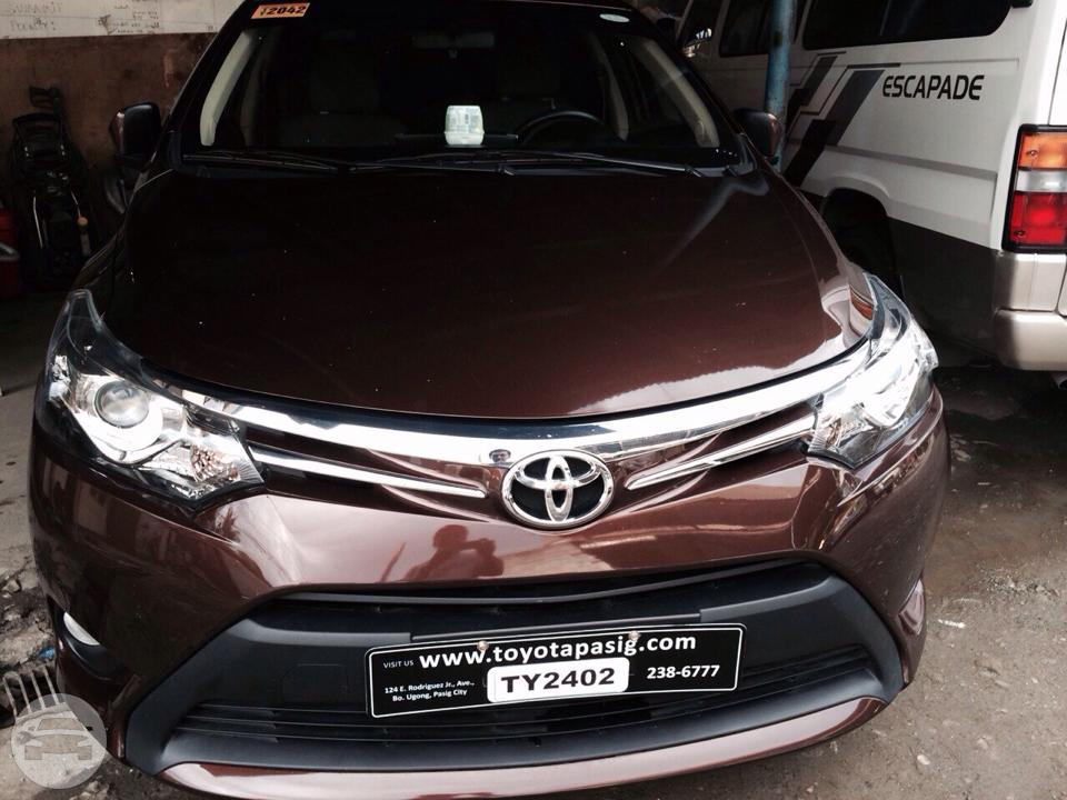 Toyota Vios Brown Urvan Zone Van Rental Services