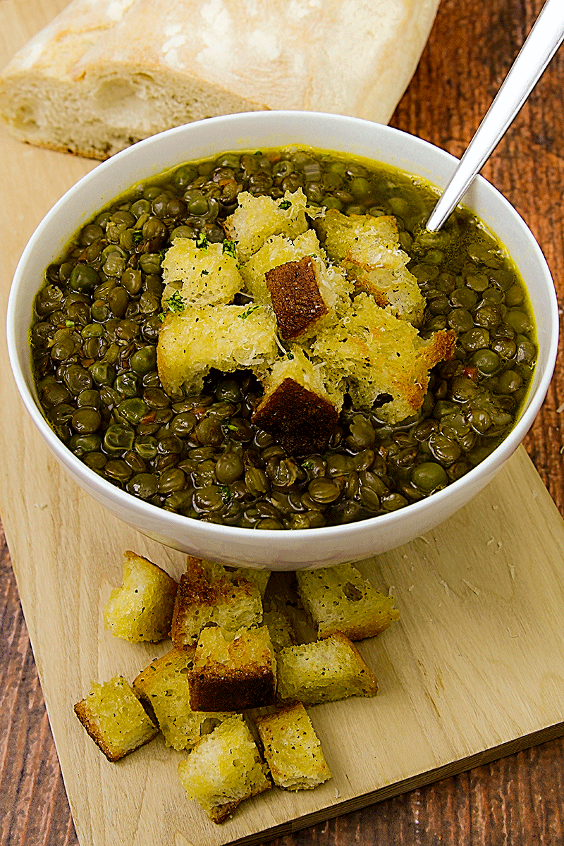 lentils and peas soup with diced toasted bread