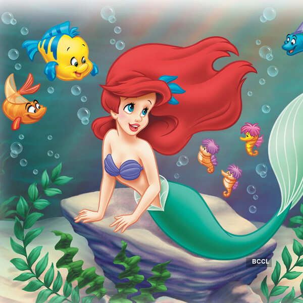 Ariel and Flounder in the still from an animation movie The Little Mermaid.