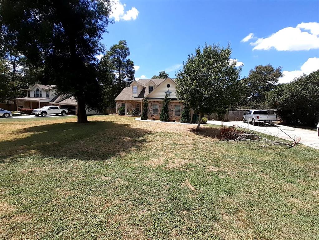 10919 Forest Creek Drive N, Willis, TX 77318