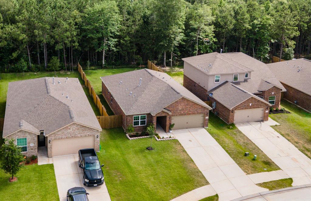 7707 Boulder Sunstone Lane, Conroe, TX 77304