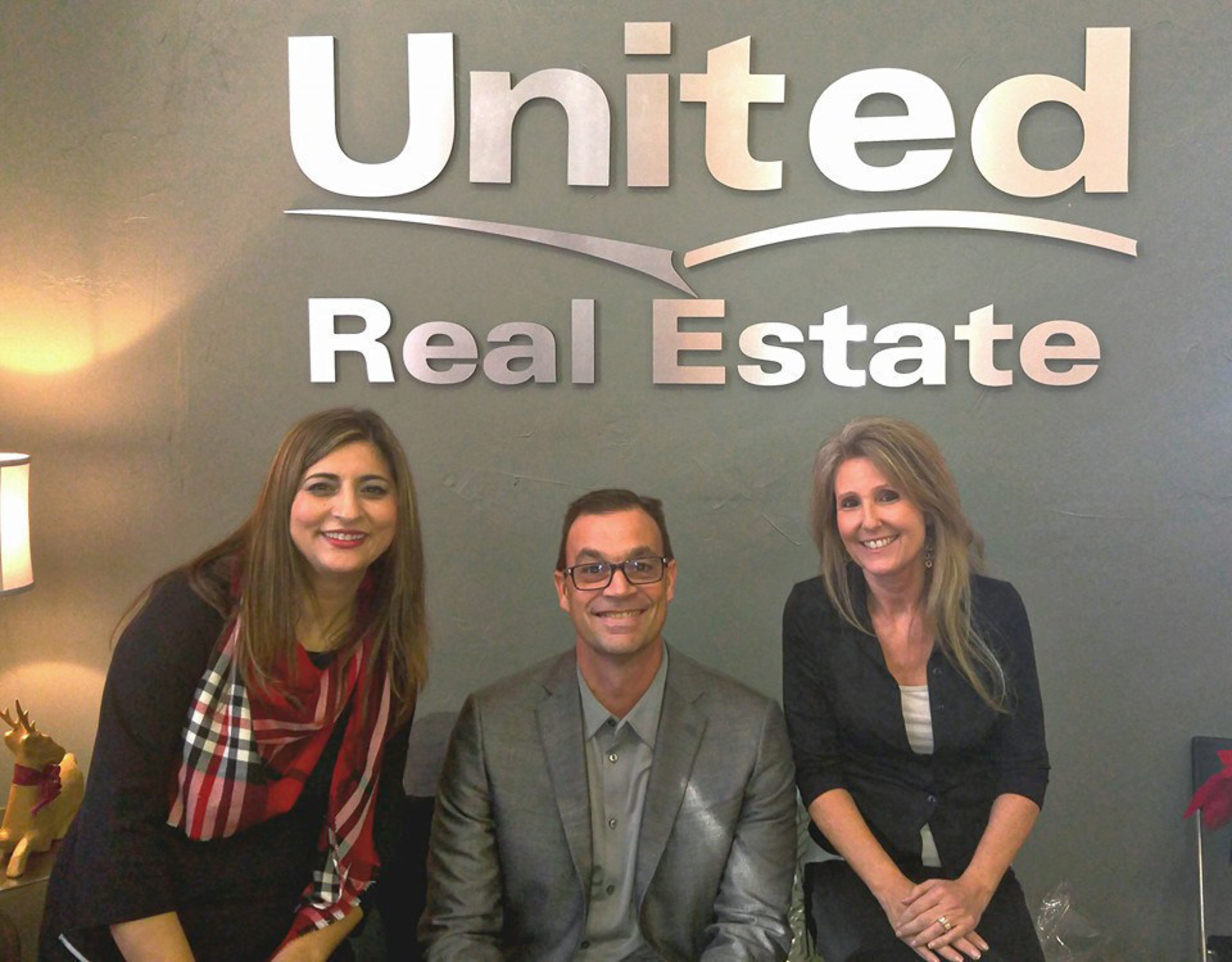 United Real Estate Partners With