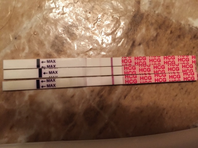 Faint positive on wondfo and negative on clearblue digital. Pictures