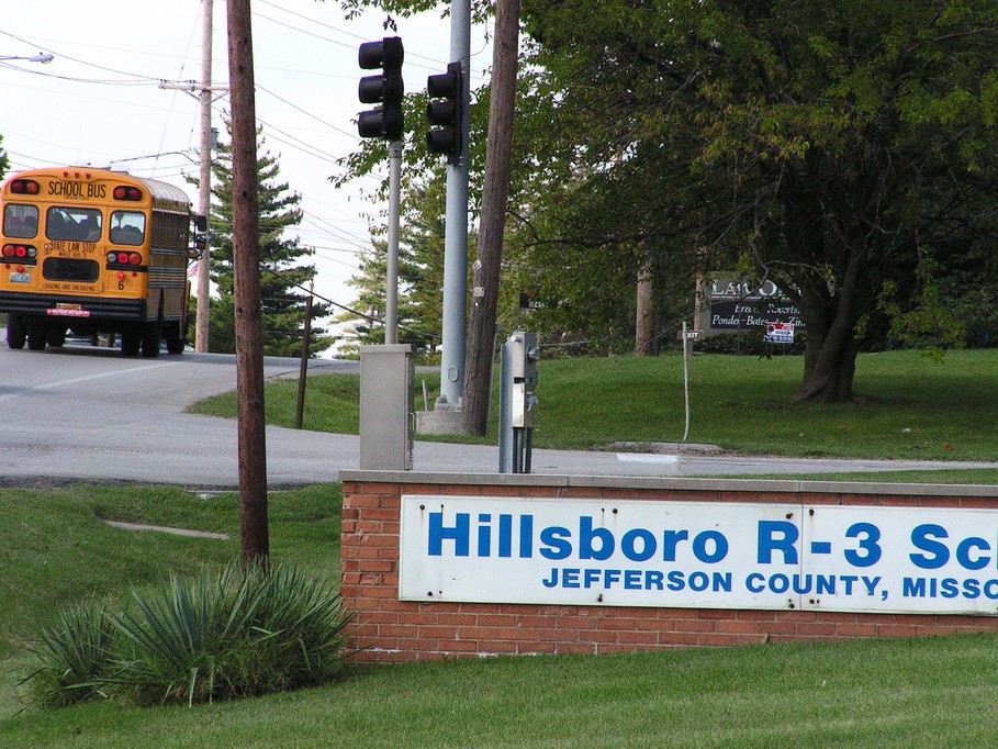 Hillsboro, MO Hillsboro R3 school bus taking students home. photo
