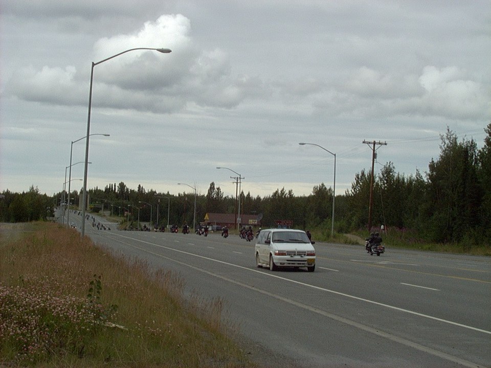 Sterling, AK Group of Harley riders riding through Sterling on an