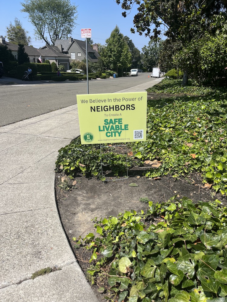 Piedmonter plants “Neighbors Together Oakland” lawn signs to rally