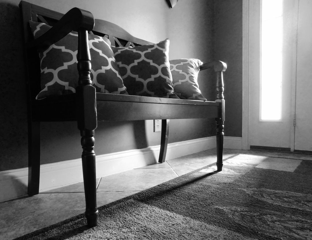 a bench in a hallway from Pikwizard