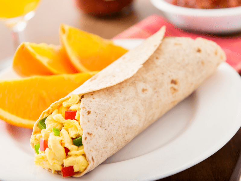 15 Best Side Dishes To Serve With Breakfast Burritos Piled Plates