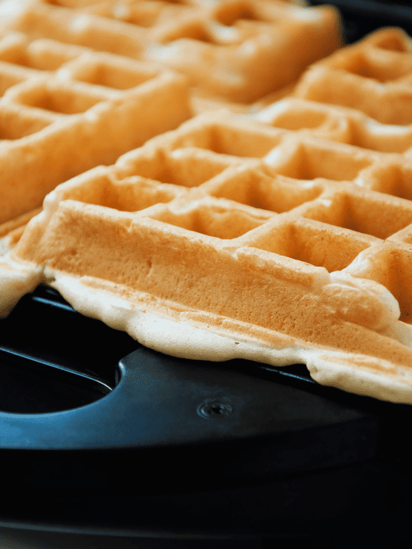 5 Signs That Show Your Waffles Are Done Cooking Piled Plates