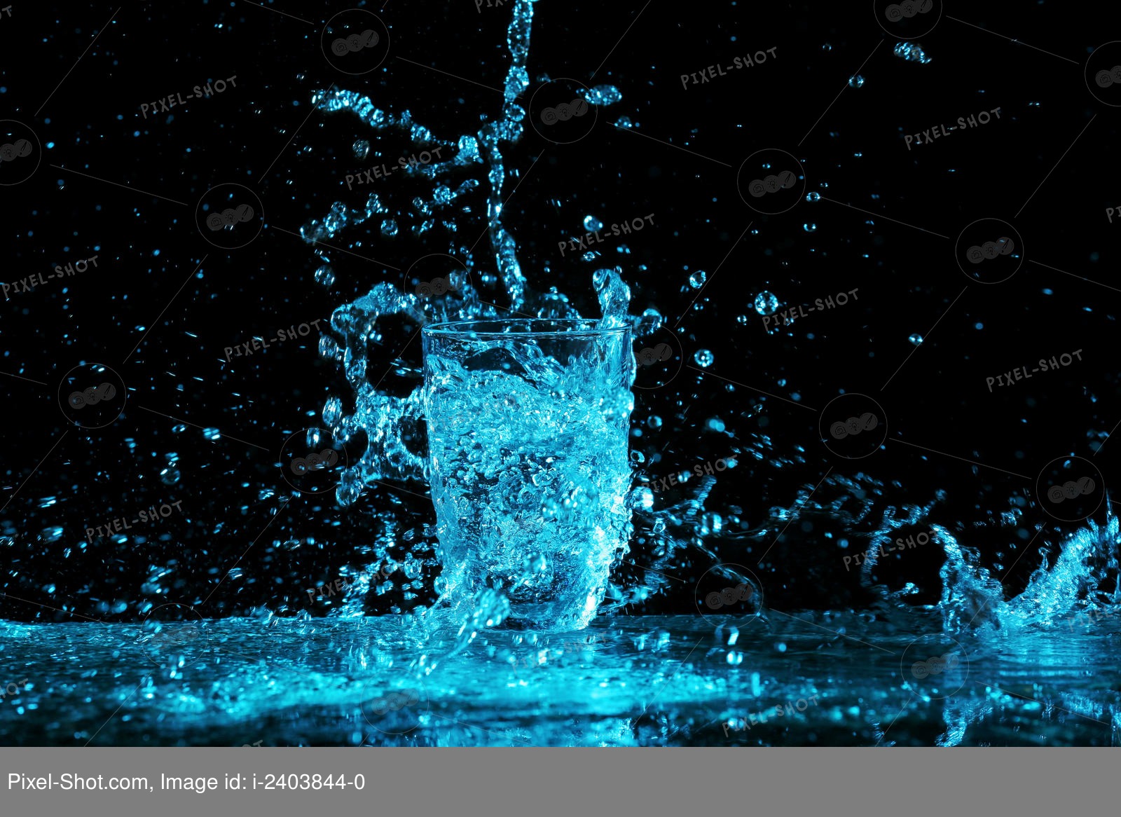 Pouring water into glass on black background Stock Photography