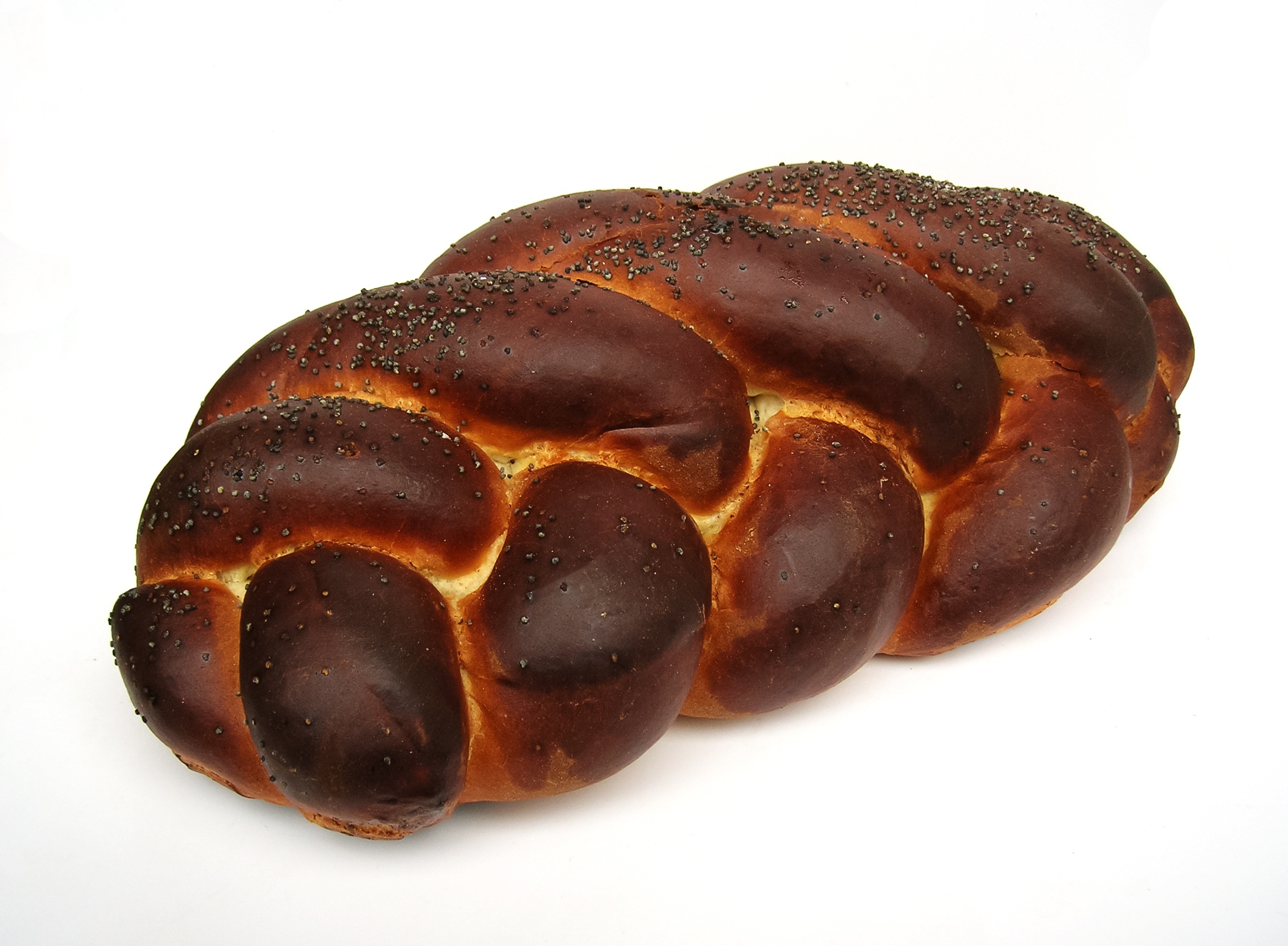 Challah sprinkled with poppy seeds, traditional jewish bread free image