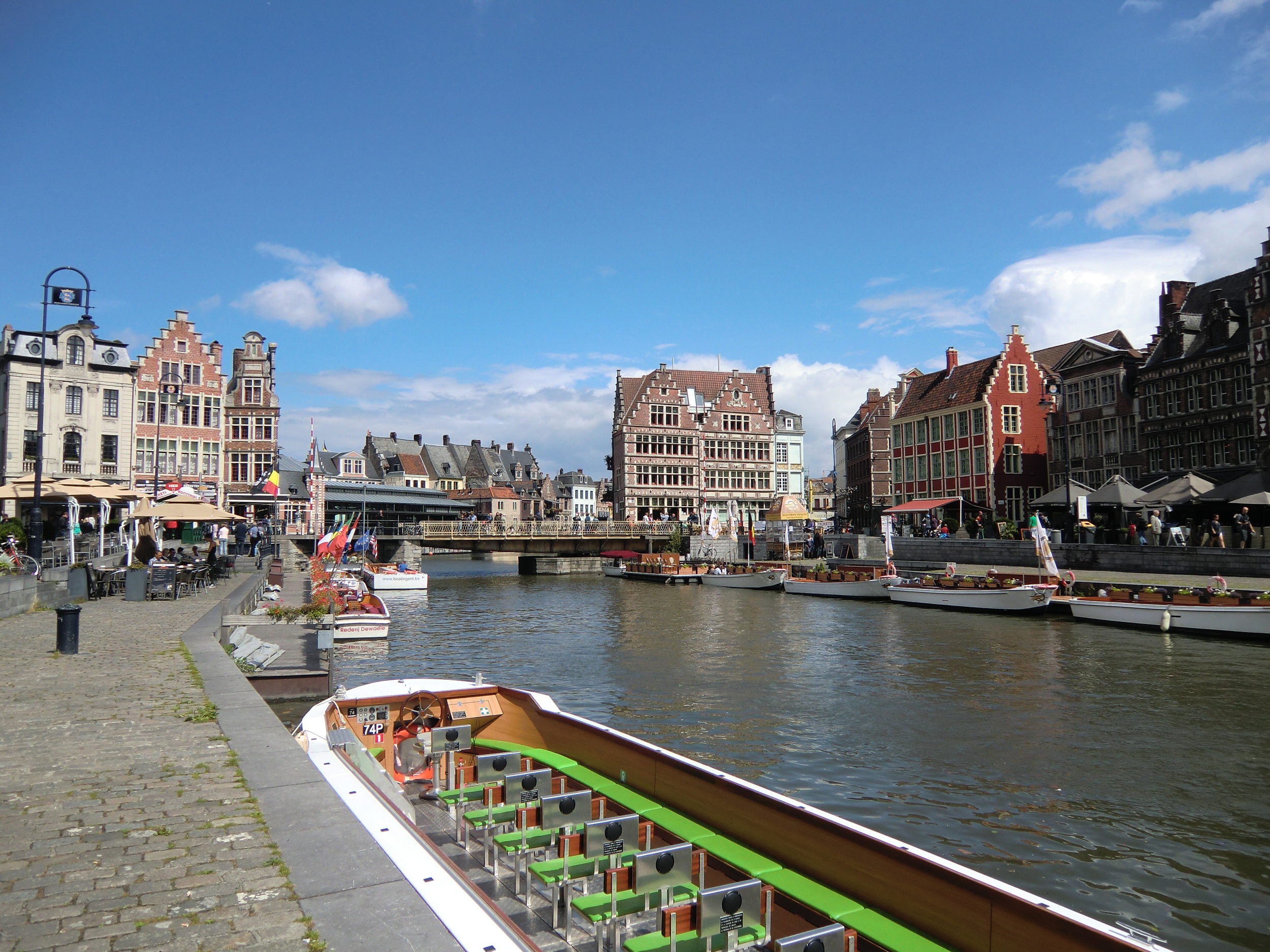 Boats at riverside in old picturesque town, belgium, ghent free image