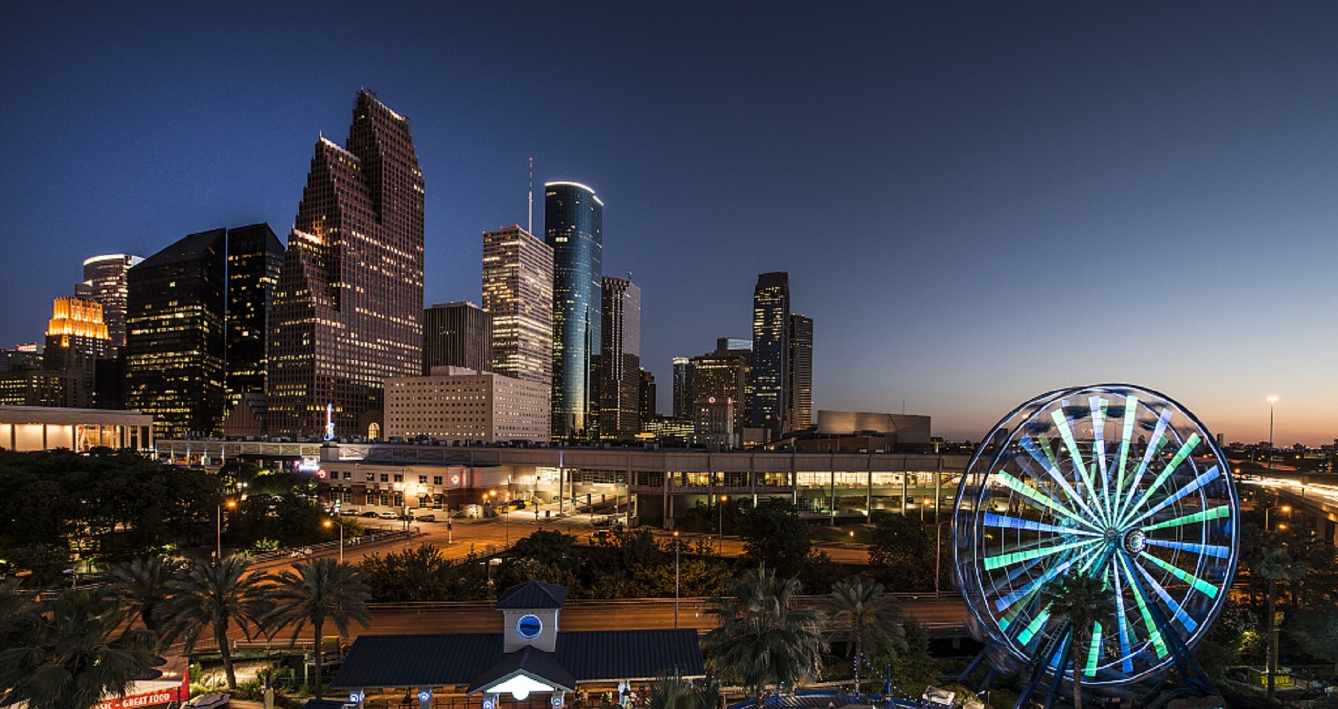 Night city skyline with ferris wheel, usa, texas, houston free image