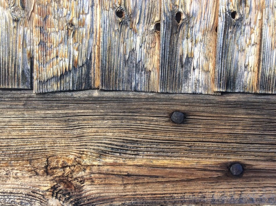 Nails in weathered wooden wall free image download