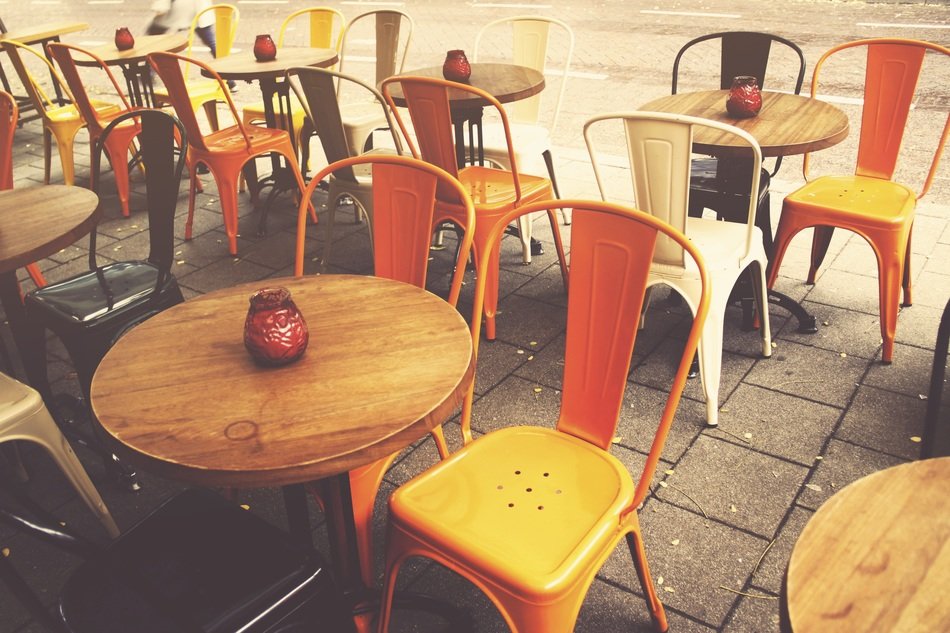 Furniture in sidewalk cafe, netherlands, rotterdam free image download