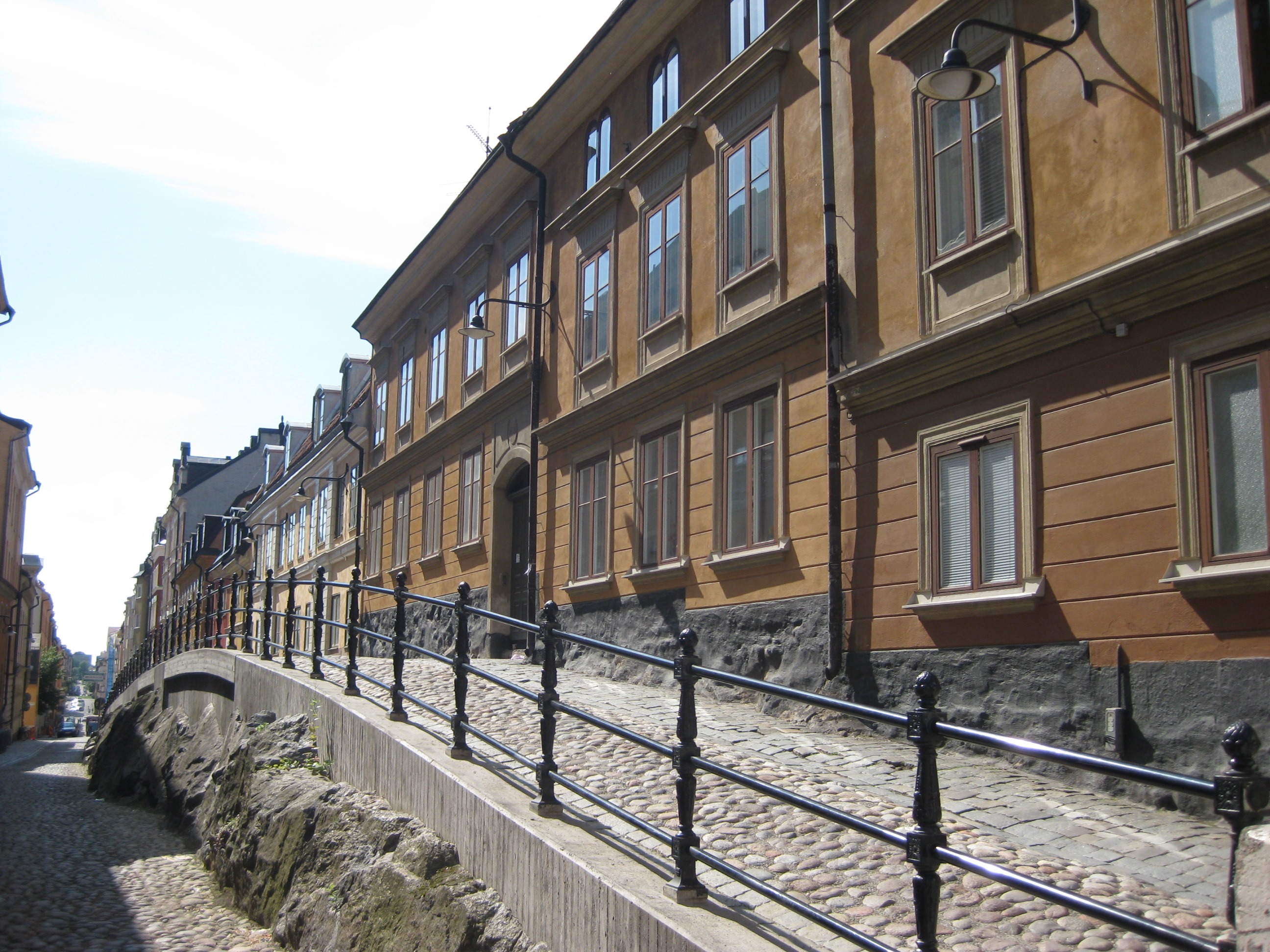 Alley with cobblestone pavement in old town, sweden, stockholm free