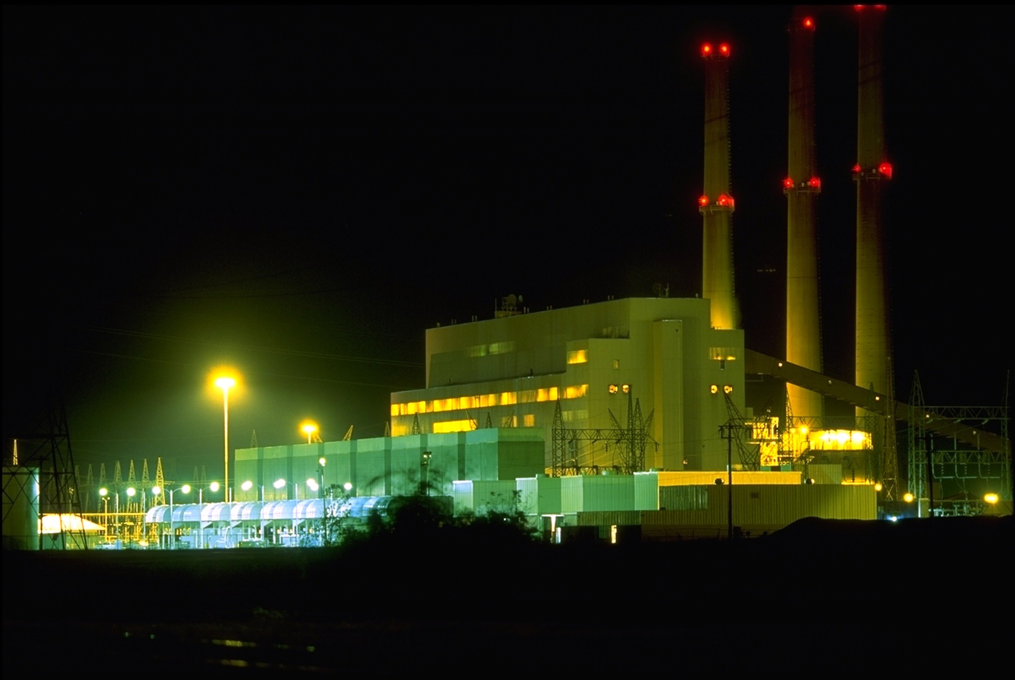 Fossil fuel energy plant at night free image download