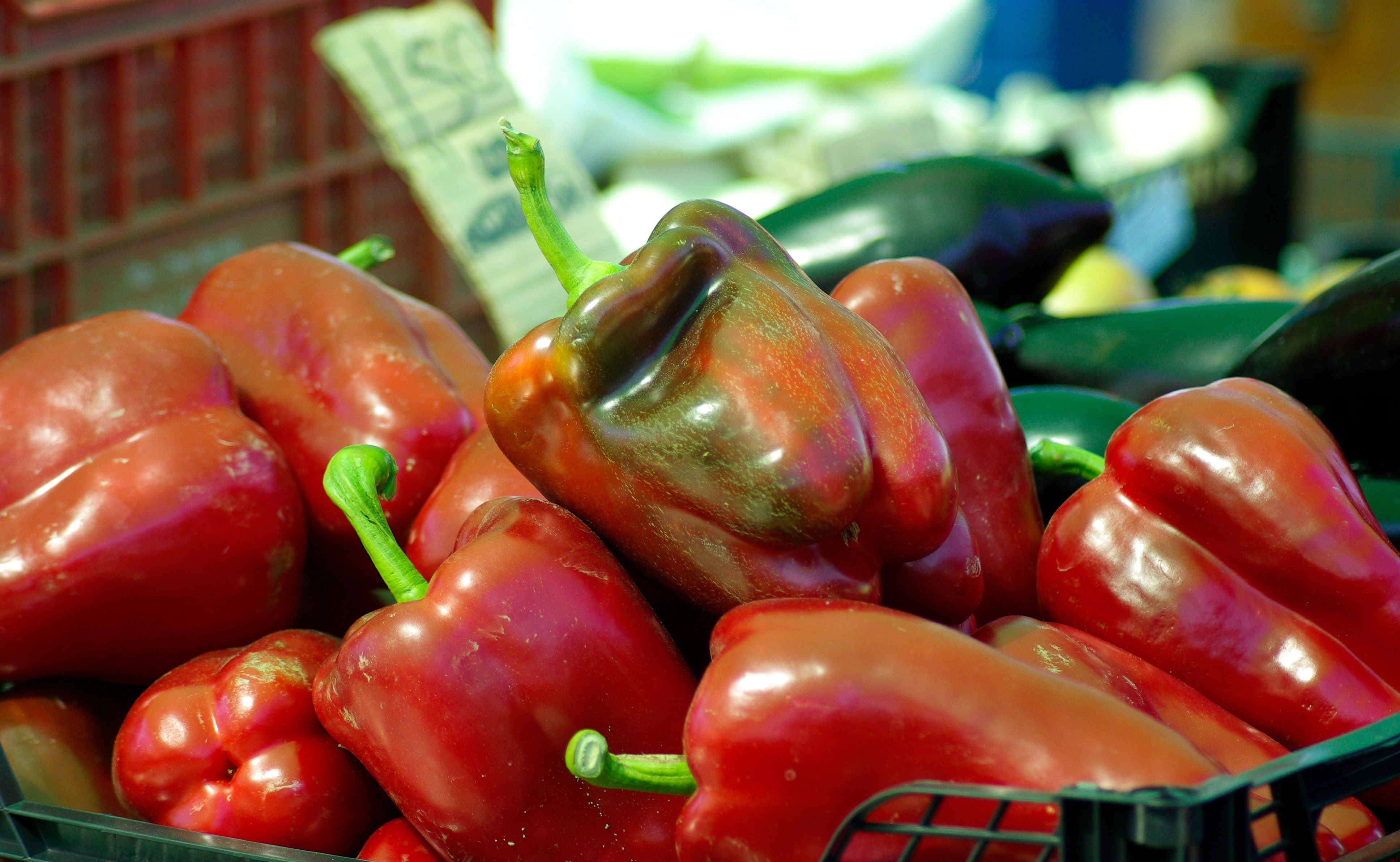 Red bell peppers on the market free image download
