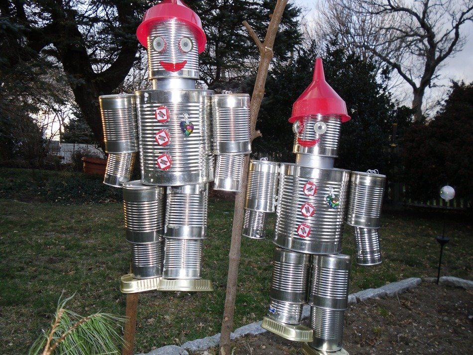 Two funny tin can men in garden free image download