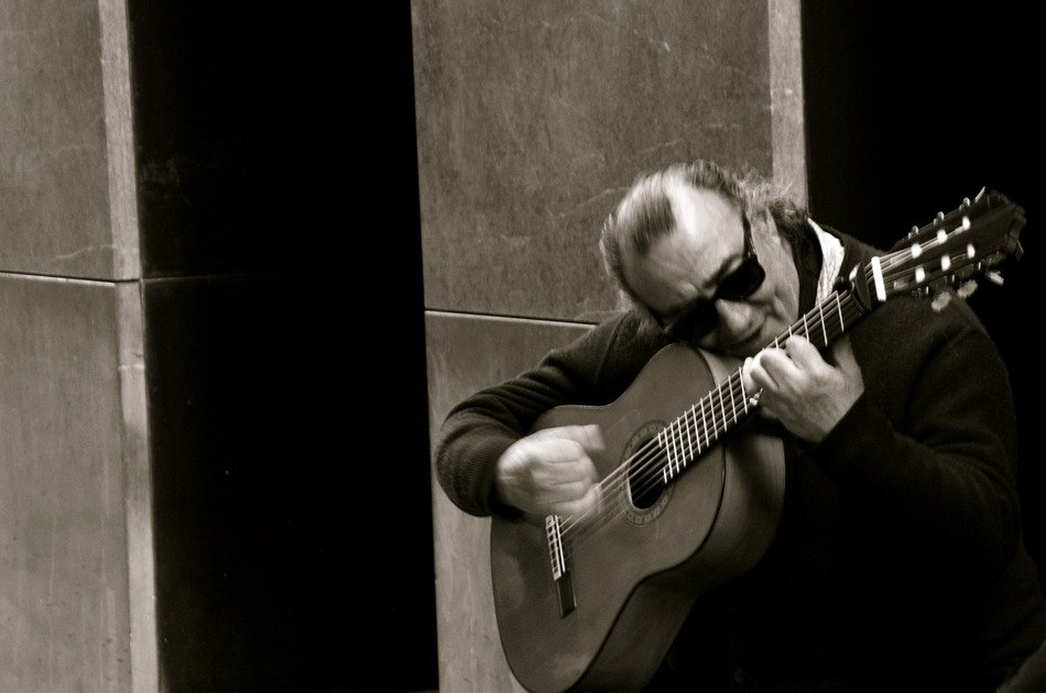 Spanish guitar player playing flamenco free image download