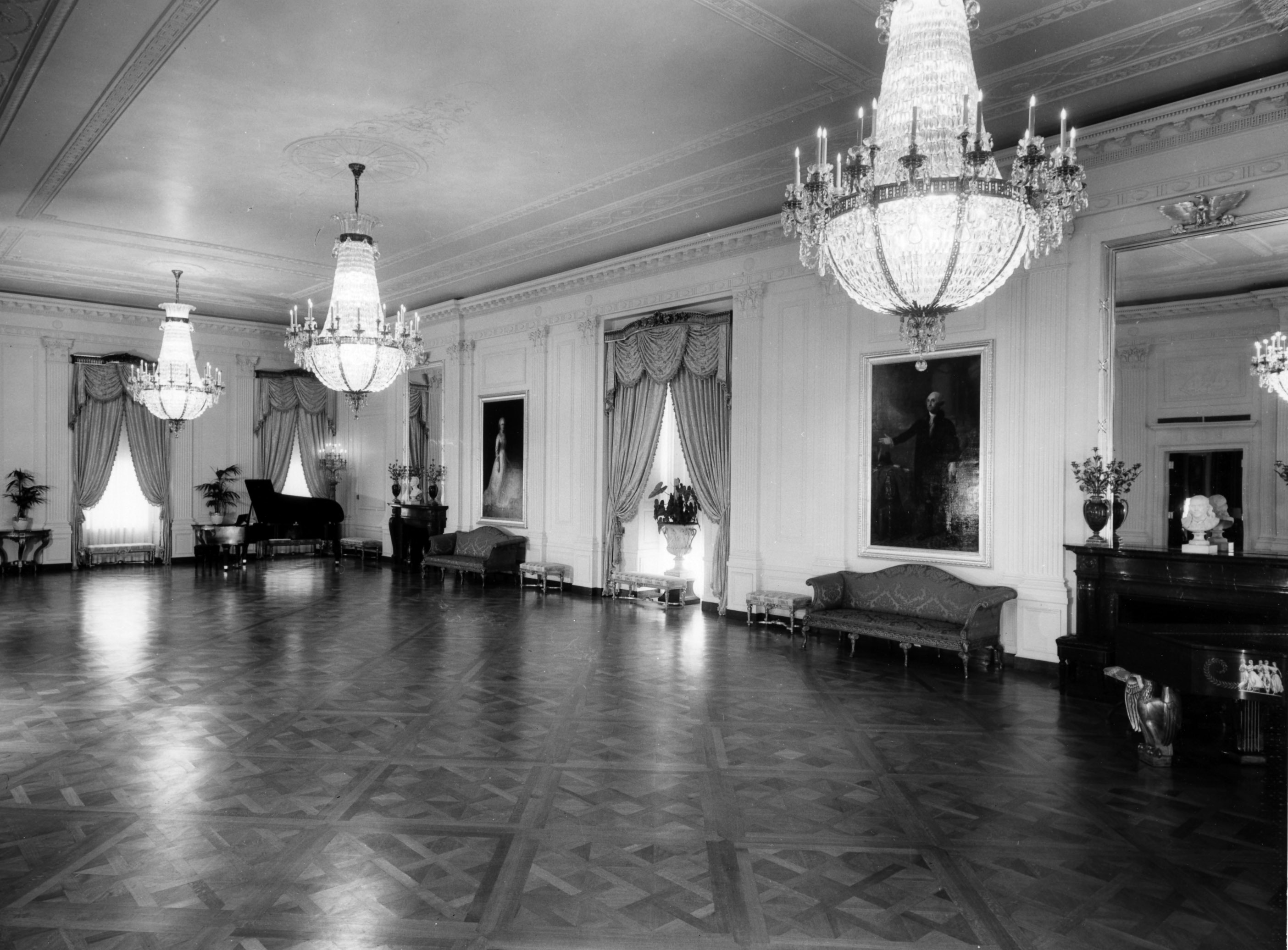 1952 black and white photo of the east room in the White House