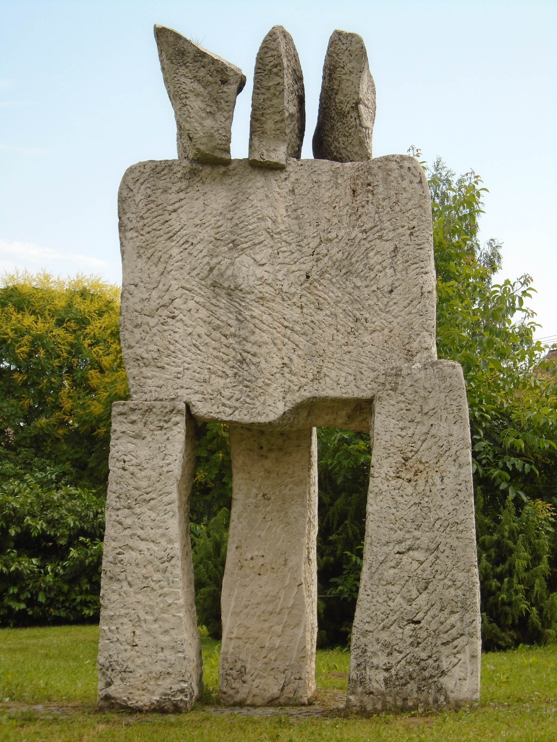 Modern stone statue in a park free image download