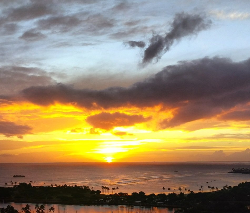 Yellow sunset over the hawaiian coast free image download