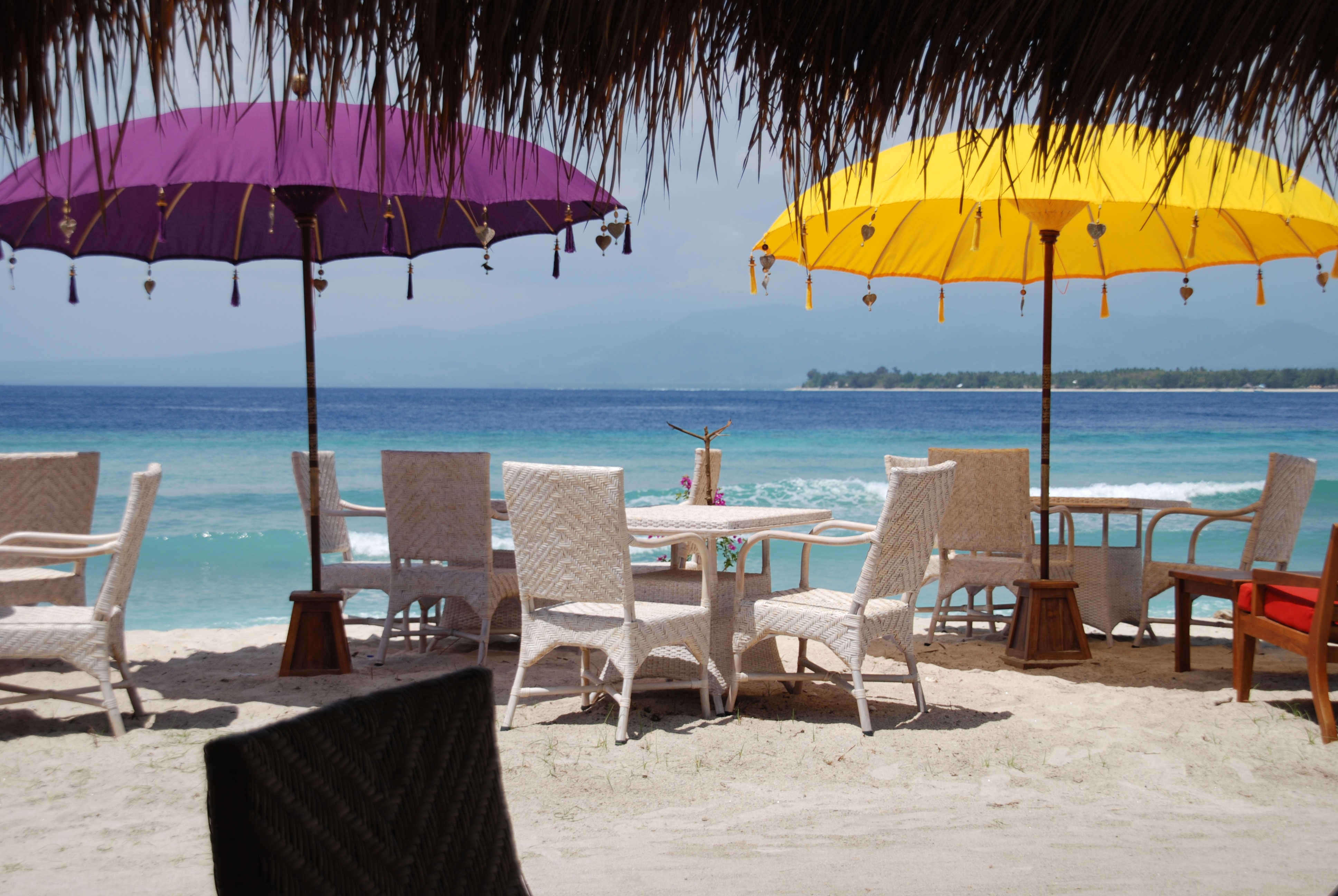 Bright umbrellas on bali beach free image download