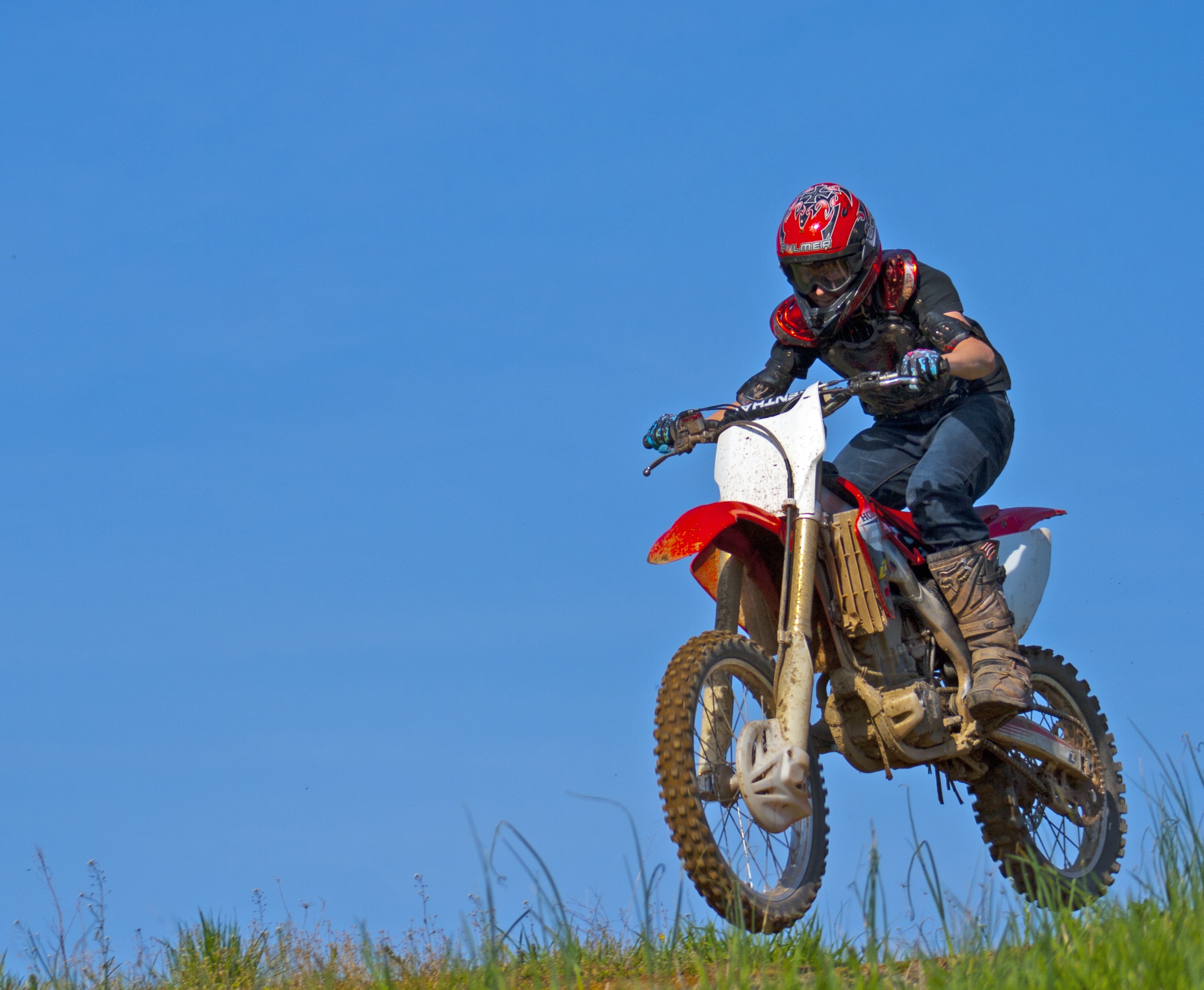 Dangerous jump in motorcycle racing free image download